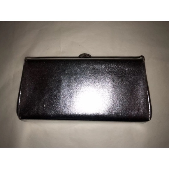 Chic Black Wristlet with Sleek Design and Metallic Accents - Picture 10 of 16